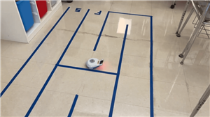 finch robots are programmed to follow a maze created on the floor